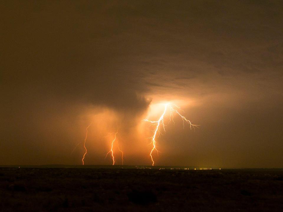 Lightning striking in Elmley, Kent, during a thunderstorm last night