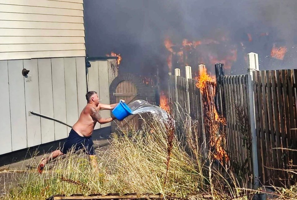 A braze resident turns to douse flames in Barnsley