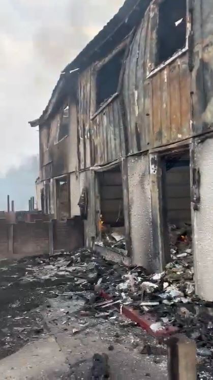 Charred possessions could be seen spilling out of the homes