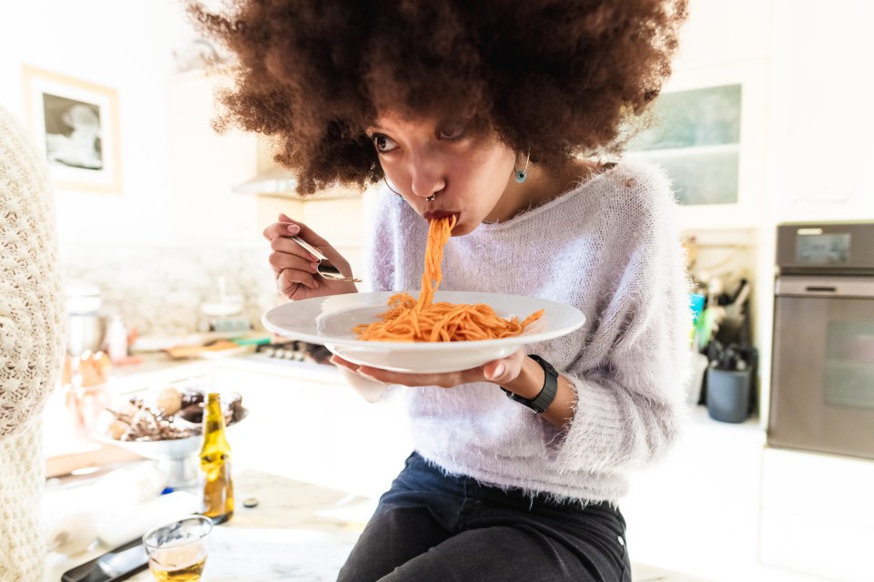 The etiquette expert notes you shouldn't overindulge in food. Pictured, stock image