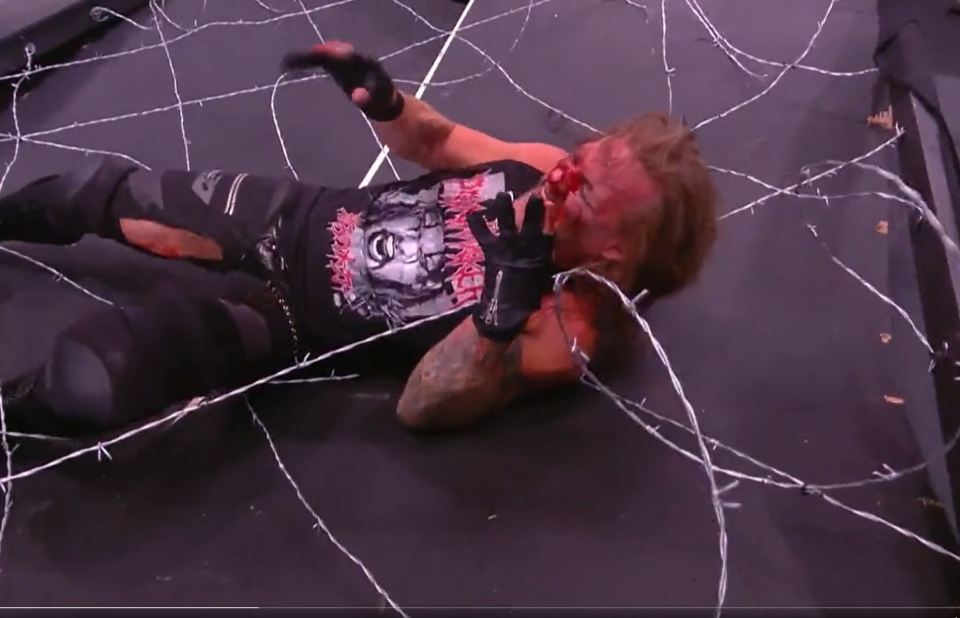 Chris Jericho was stretchered out after a brutal Barbed Wire Everywhere match