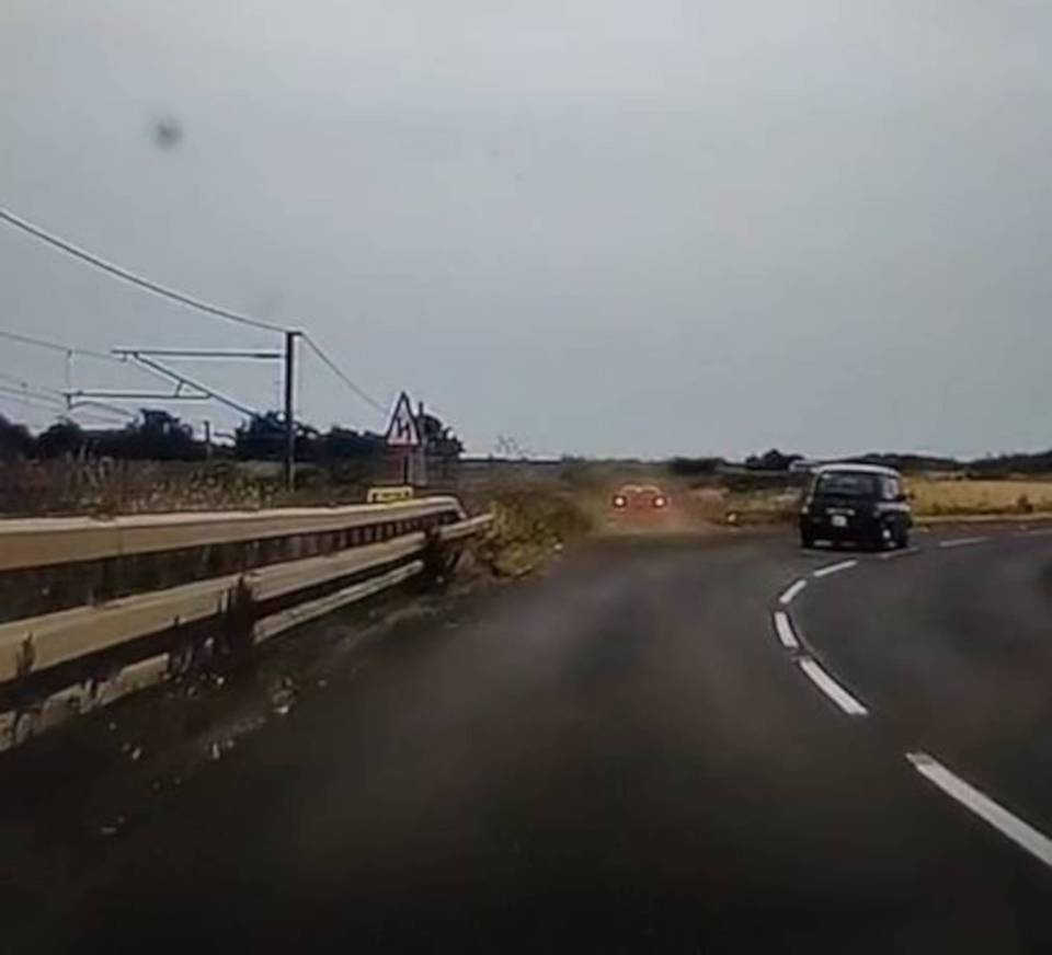 The Toyota driver turns into a small lane just on the left from the near-miss - rendering the risky overtake completely pointless