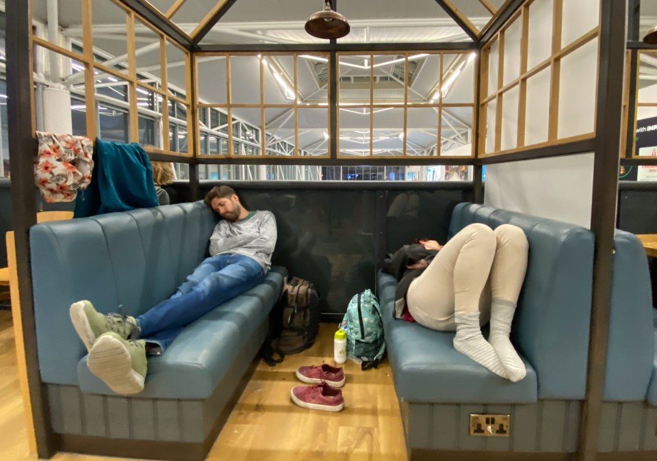 Exhausted travellers were seen sleeping wherever they could at Bristol Airport