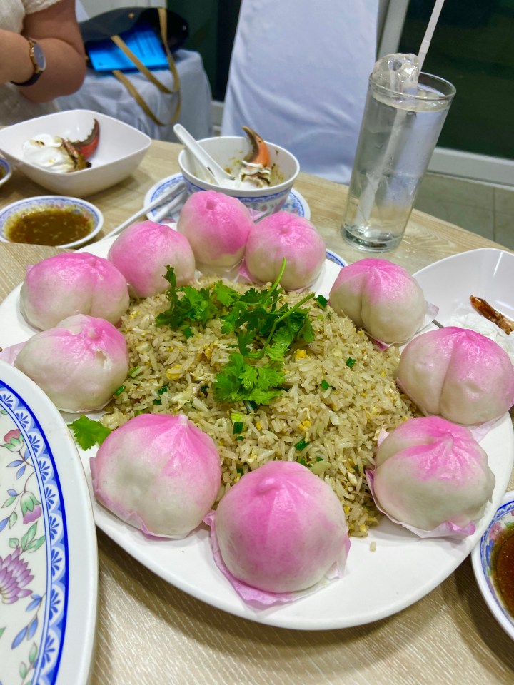 Sophie sampled these bright pink bao-style buns stuffed with creamy bean curd in Bangkok