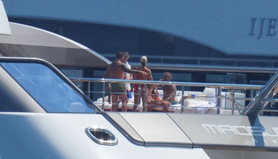 Victoria could be seen sunbathing as they hosted guests on the boat