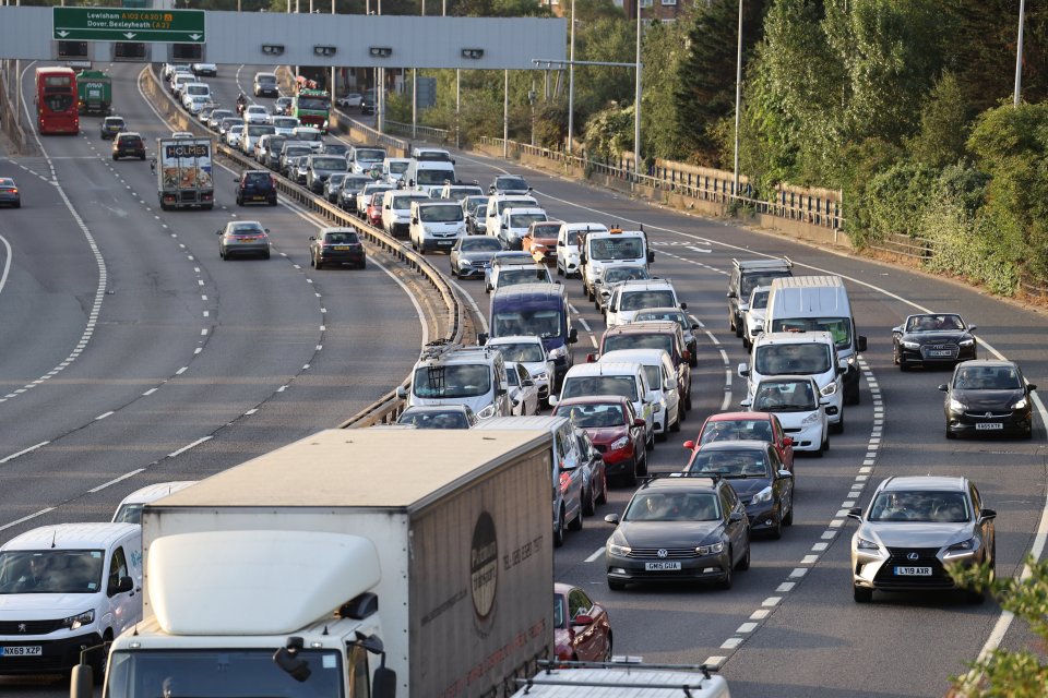 Traffic queues on the A102M Blackwall Tunnel approach in Greenwich in South East London as rail strikes begin