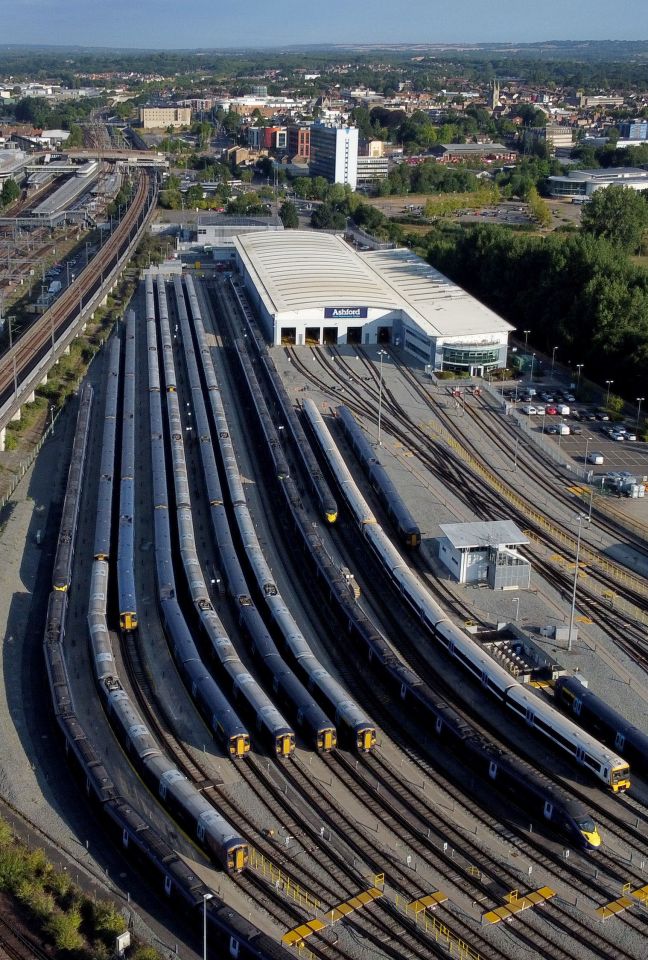 A view of Southeastern trains in sidings near Ashford railway station in Kent this morning