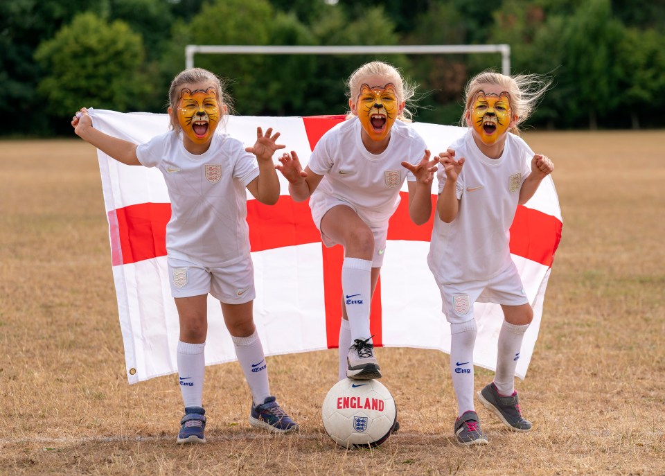 Lionesses fans Emily Gibbons, Belle Northwood and Anna Roberts had their faces painted by face painter Trudles Doodles