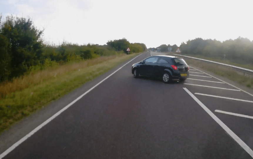 This is the moment a Vauxhall Corsa driver loses control as he overtakes a lorry on an Oxfordshire A-road