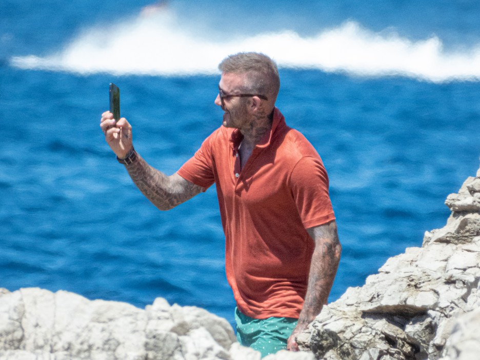 David showed off his grey hair - and took a moment to snap a selfie