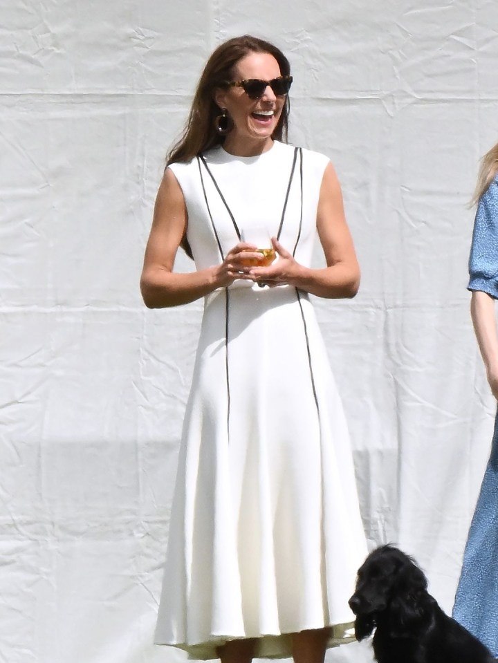 Kate beamed in high spirits at the sunny event