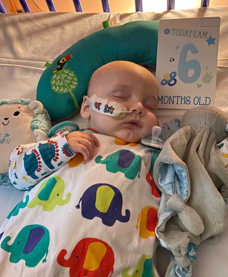 Opie was diagnosed with cancer when he was five months old. He is pictured in hospital at six months