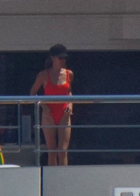 Victoria was seen wearing a slinky red one-piece