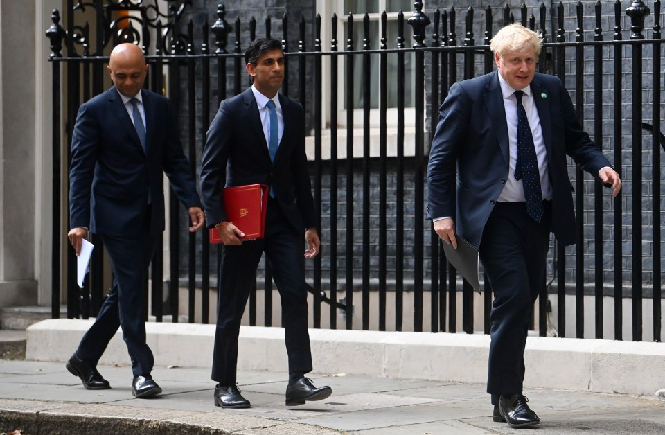 Sajid Javid and Rishi Sunak, pictured with PM in September, quit the Cabinet