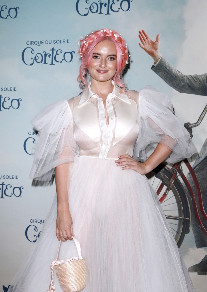 Grace Chatto would struggle to jump around on stage in this dress - luckily she was in the audience