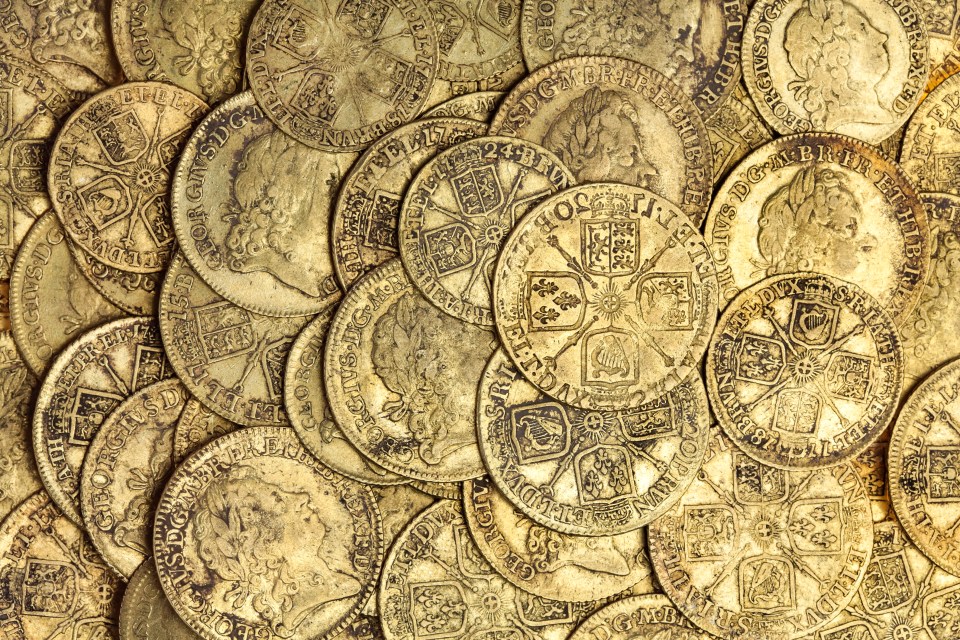 A couple are set to be £250,000 richer after finding a jar of 400-year-old coins while renovating their home