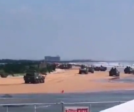 Further footage shows tanks on beaches along the Taiwan Strait