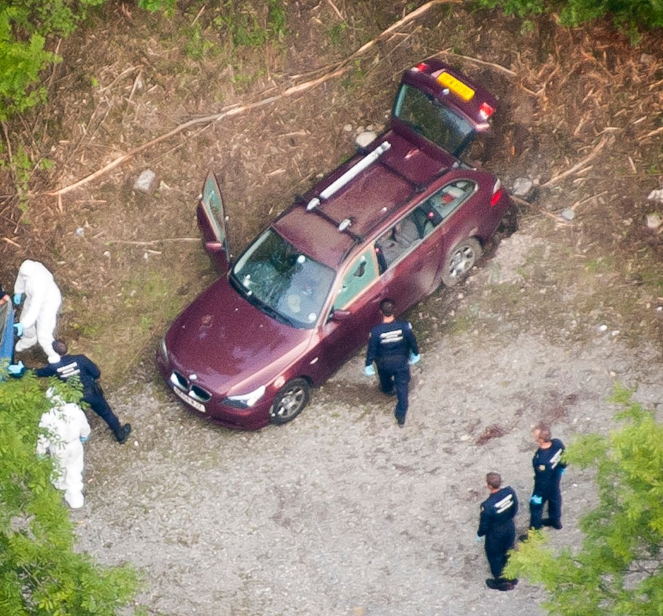 The crime scene - police with the al-Halli family’s BMW