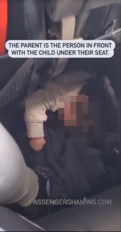 The child was under the seat of their parent during the journey