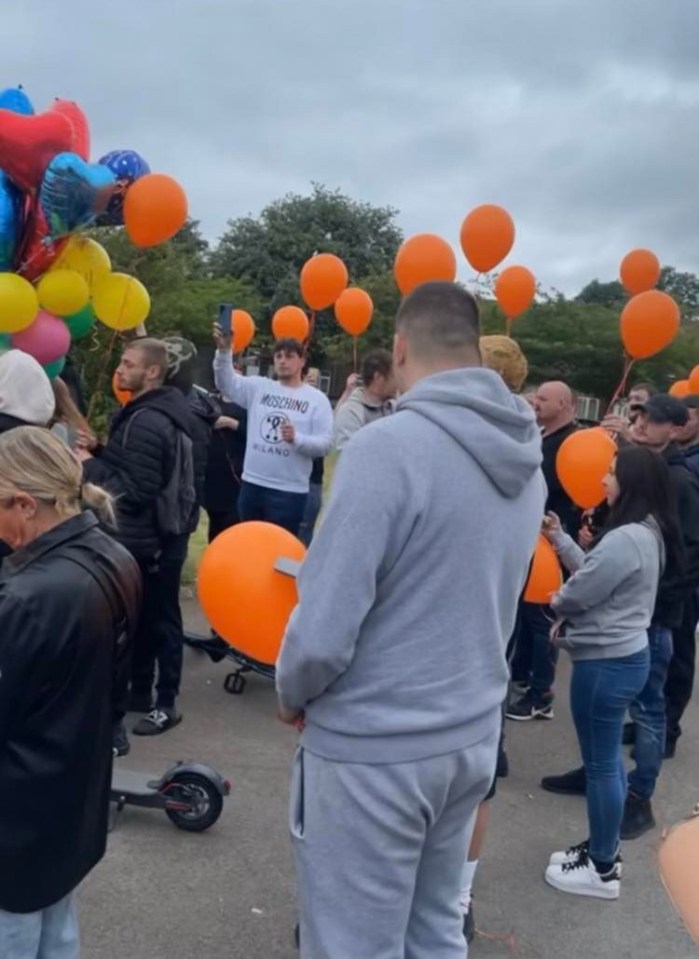 His devastated pals held a balloon release in honor of the late 29-year-old