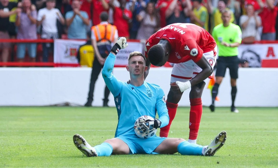 Dean Henderson reacts to saving Declan Rice's penalty