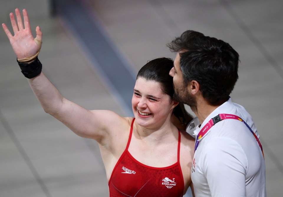 Andrea with her coach after her final dive