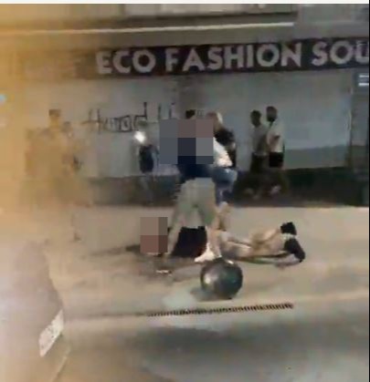 The clip shows the man being beaten in the middle of the street