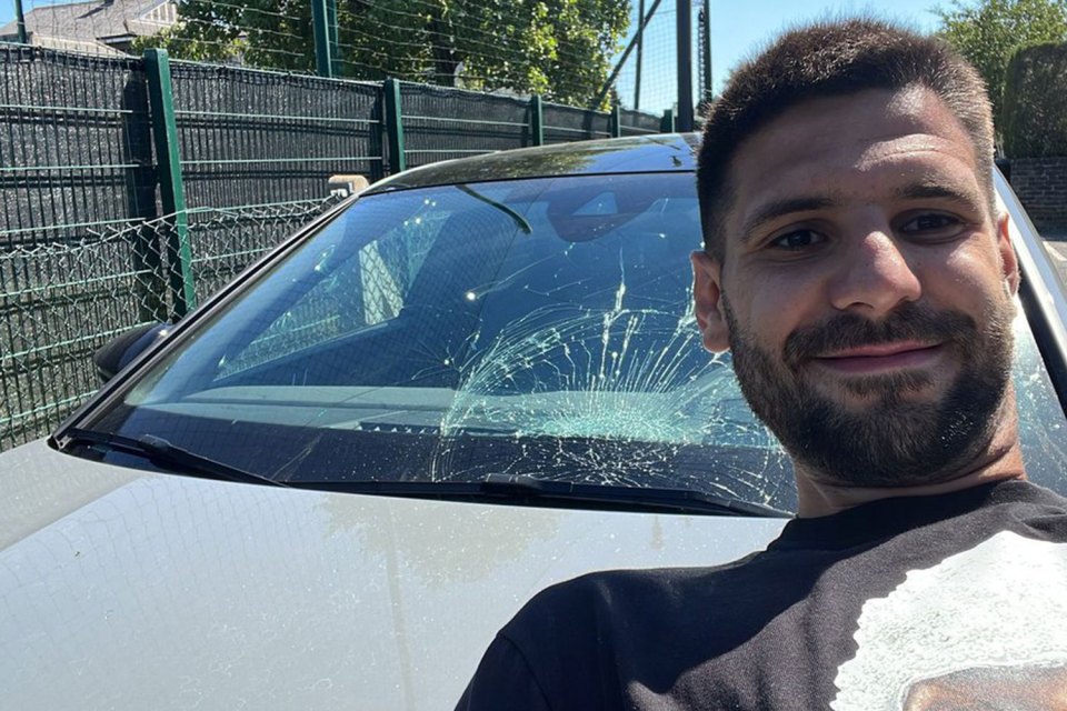 Mitrovic showed no remorse as he posed in front of Cairney's car