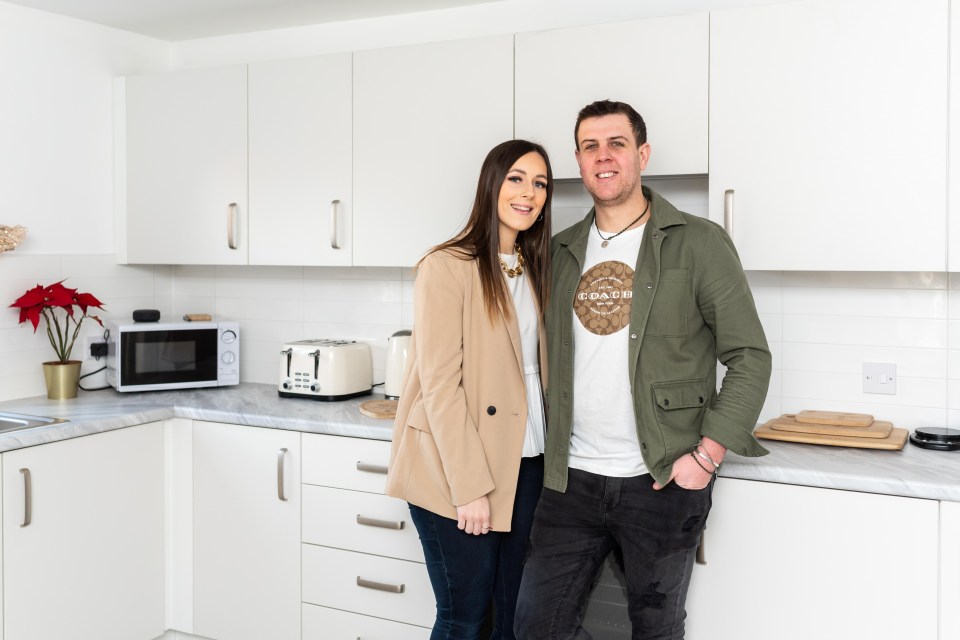 Elly and Callum Tully in their kitchen