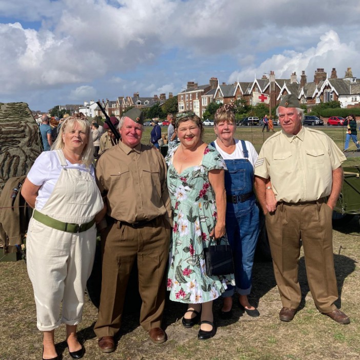 Cheryl and her "family" posed for pictures all wearing 1940s attire