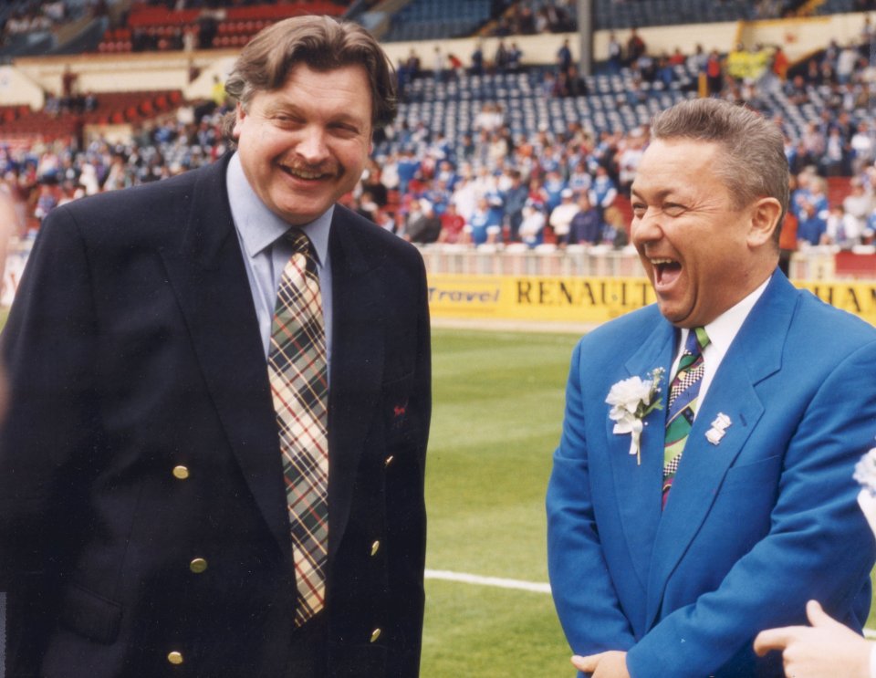 The then-Carlisle owner chats with David Sullivan at the 1995 Auto-Windscreens Shield final