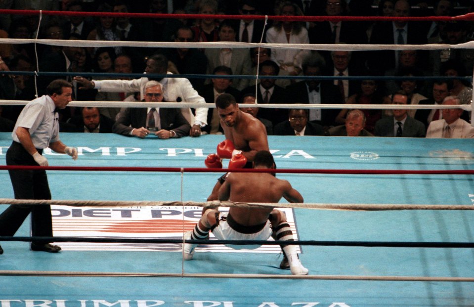 Mike Tyson knocks out Michael Spinks in 1988