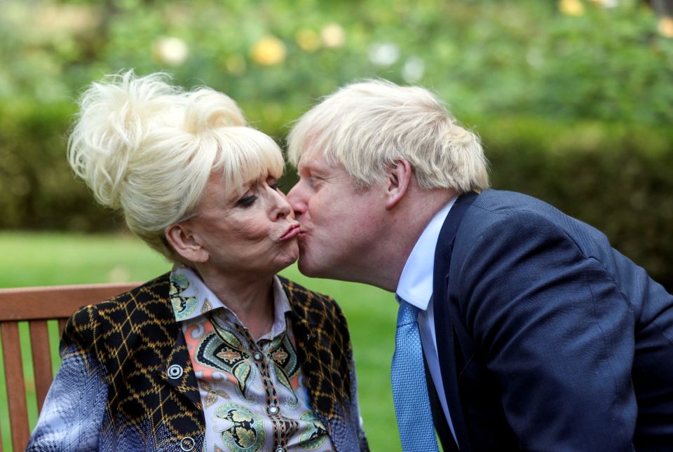 The PM today announces a £95million funding boost alongside a new mission to tackle dementia, pictured with Dame Barbara Windsor