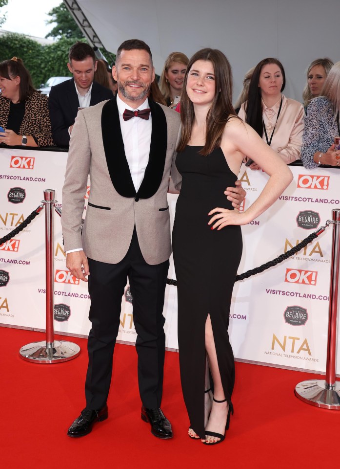 Sirieix alongside his daughter on the red carpet