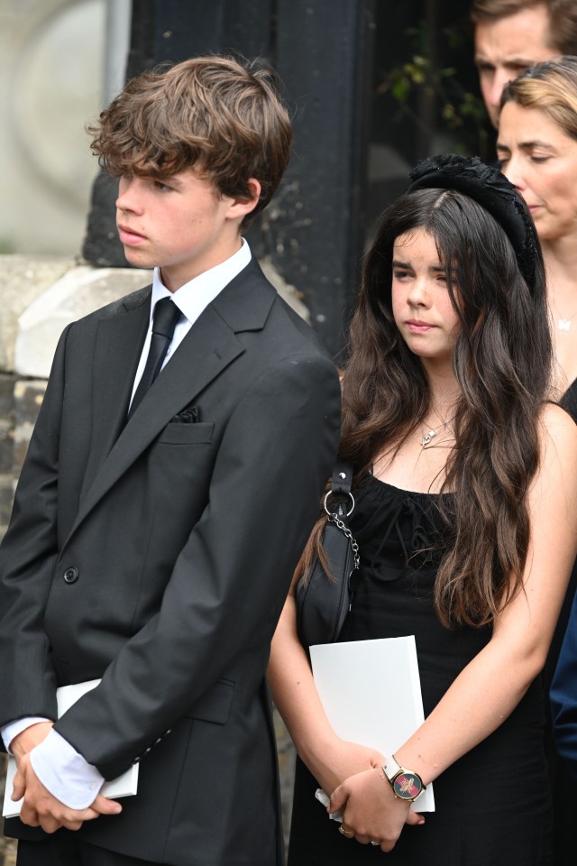 Heather said children Hugo and Eloise, pictured at Debs' funeral, missed their mum but are enjoying life because "that's what mummy wanted"