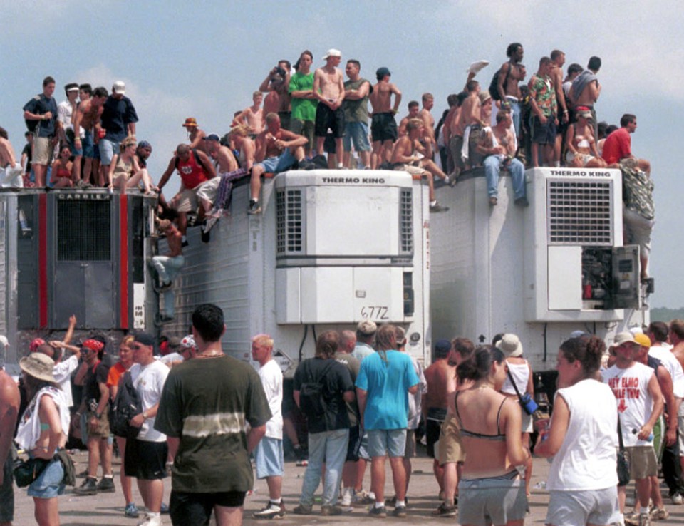 Kids climb on the trailers