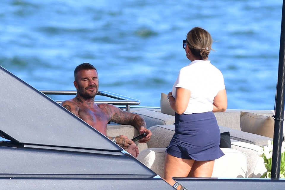 The footballer was seen chatting to a lady on the boat