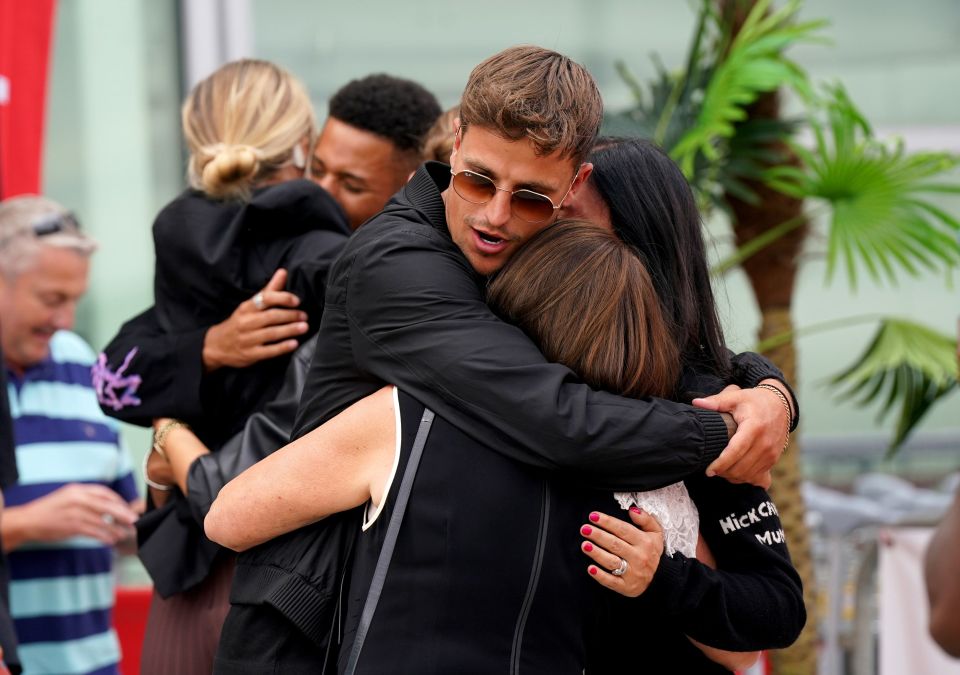 Luca looked emotional while hugging his loved ones