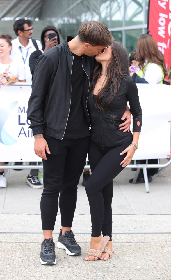 Luca and Gemma had a cheeky kiss at the airport