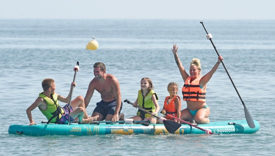 The family had fun on a giant paddleboard