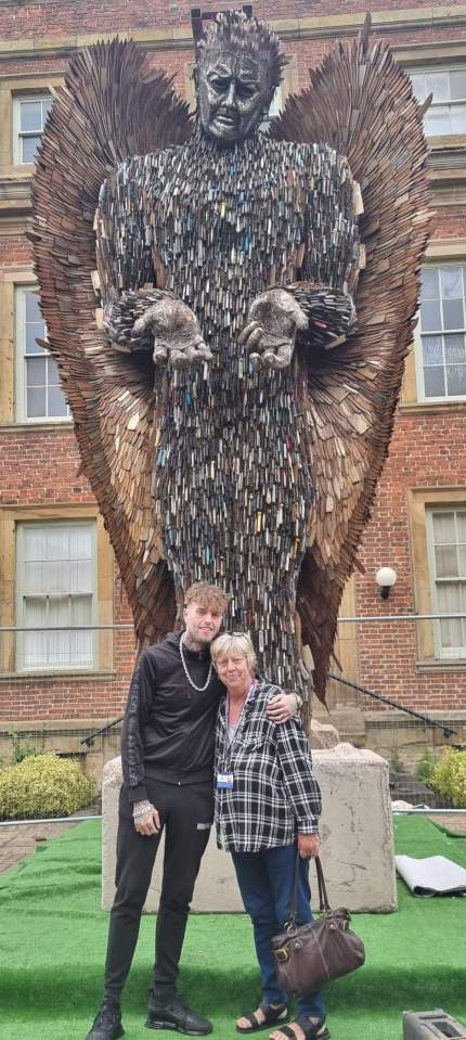 Theresa with the 'Knife Angel', a sculpture made of 100,000 discarded and confiscated knives which was installed in Redcar this week