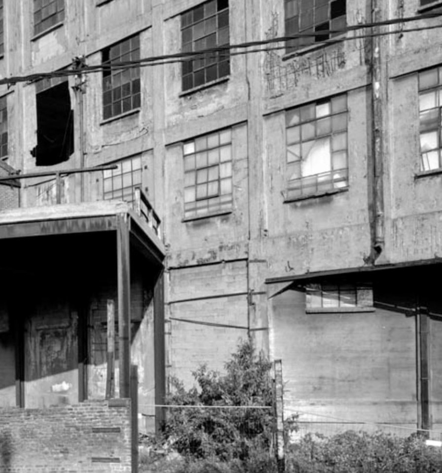 Abandoned factories surround the city