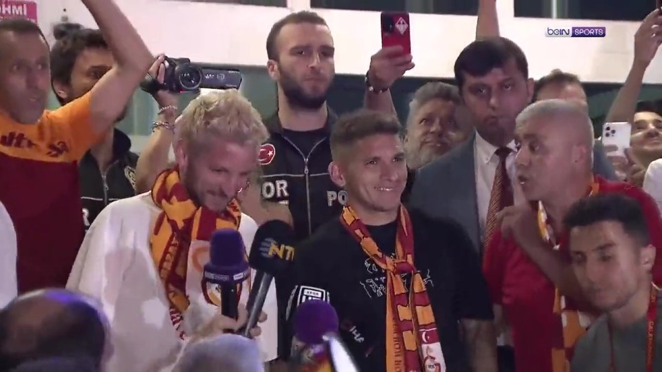 The midfielder was spotted in Instanbul draped in a Galatasaray scarf along with fellow new signing Dries Mertens