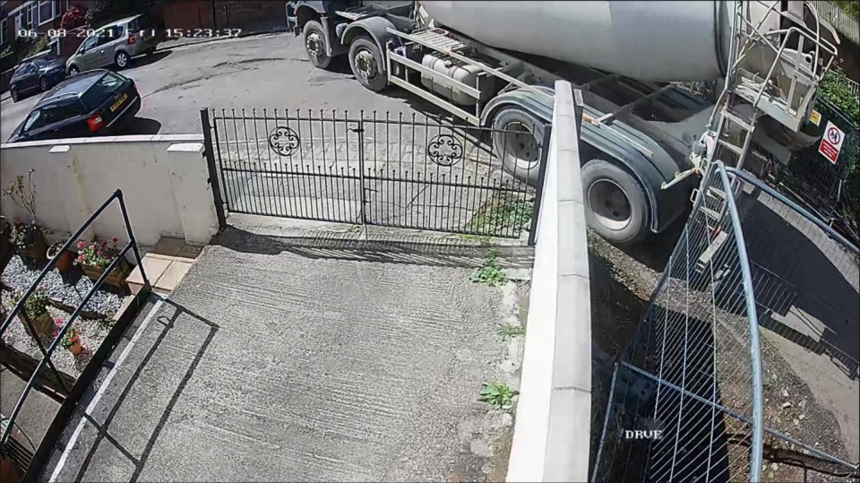 A mixer truck outside the couple's home in Bristol