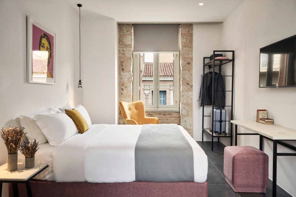 In the city centre, The Asomaton is a 100-year-old townhouse that is now a 19-room boutique hotel