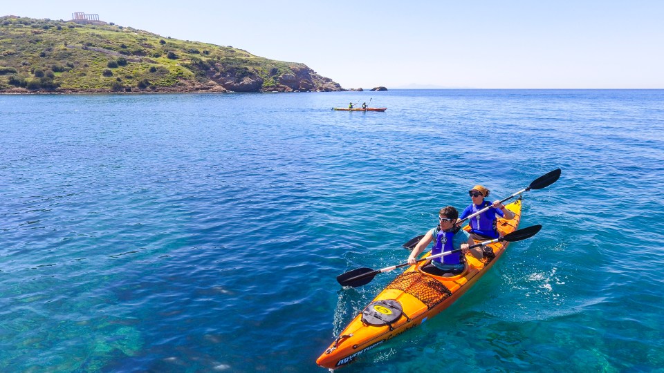 For a cooling and unforgettable end to the day, book a sunset sea kayak trip along the Athenian Riviera at Cape Sounion under the Temple of Poseidon