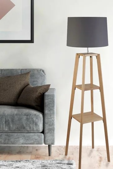 Why spend £180 on this Searchlight Smythe wood-finish shelf floor lamp from Next...