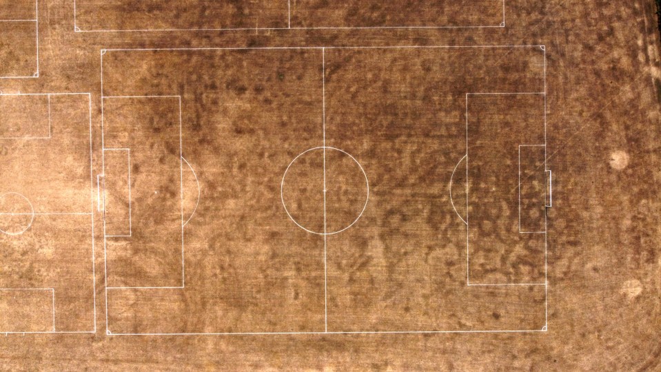 Areal view of a parched football pitch in Peterborough