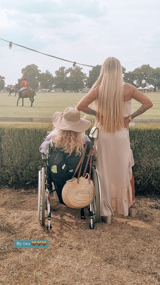 Katie could be seen standing next to her mum