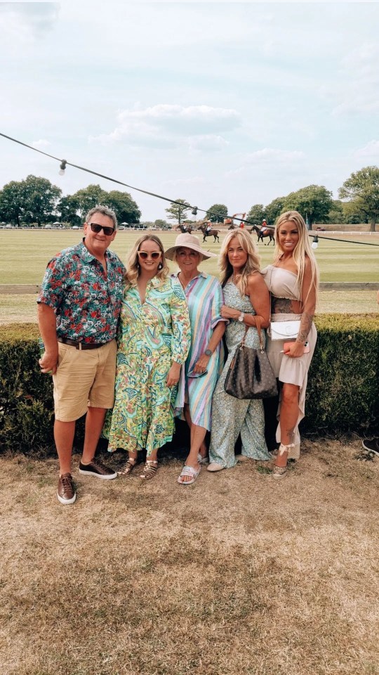 Katie Price joined her family for a day out at the polo but kept her left hand hidden